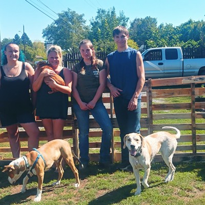 Truffle Hunters 4H group volunteered their time to put up a pallet fence for a lady who needed to keep her dogs in her yard.