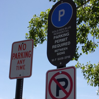 Not sure what is going on in this cluster of signs on the U of I campus
taken last June.