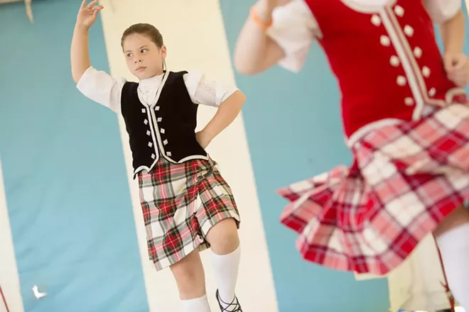 Eight-year-old Gabrilla Van Inwegen, left, and 9-year-old Elizabeth Darjany dance the Highland Fling. - YOUNG KWAK