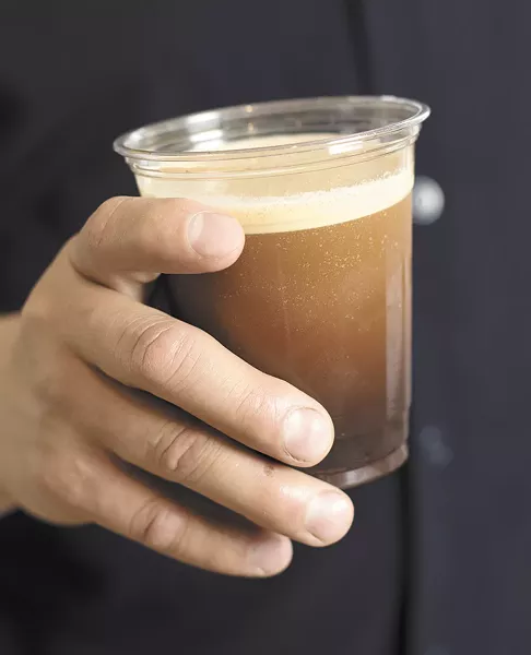A cup of Roast House Ride the Edge nitro coffee at Beautiful Grounds. - YOUNG KWAK