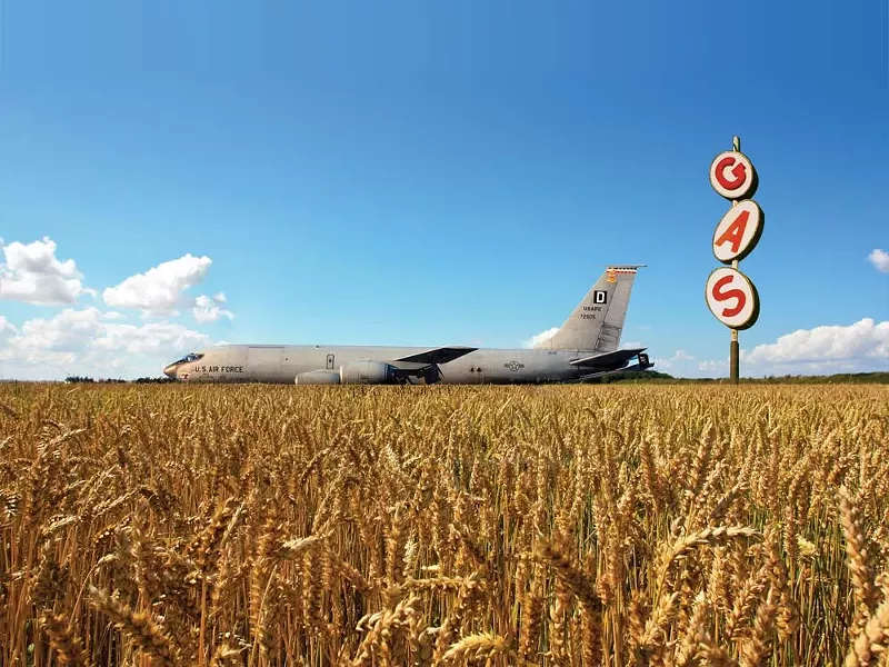 A KC-135 fuels up in a wheat field - ILLUSTRATION BY CHRIS BOVEY