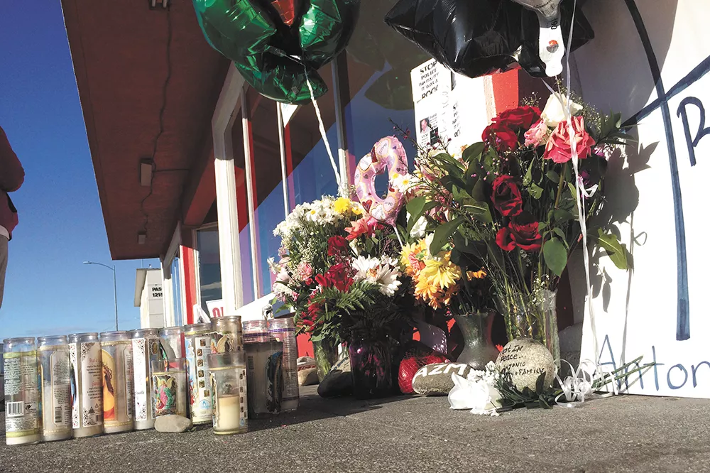 A memorial for Antonio Zambrano-Montes has become a community gathering place in Pasco. - SCOTT A. LEADINGHAM