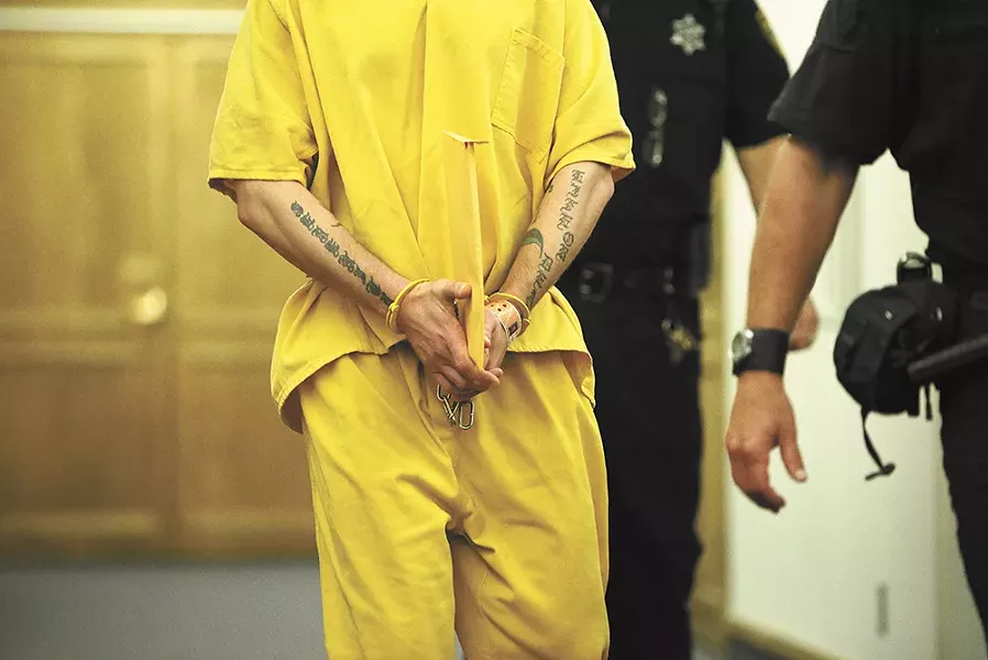 A new jail policy tries to balance courtroom safety with defendants' constitutional rights. - YOUNG KWAK