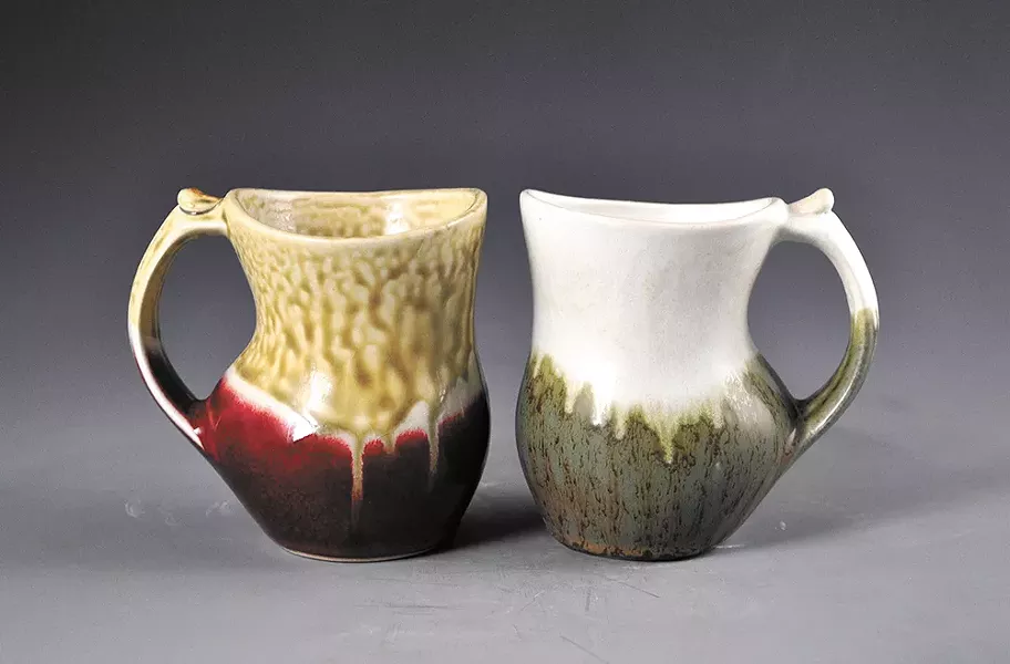 A pair of mugs by Loren Lukens featured in Trackside Studio's "Cup of Joy" show.