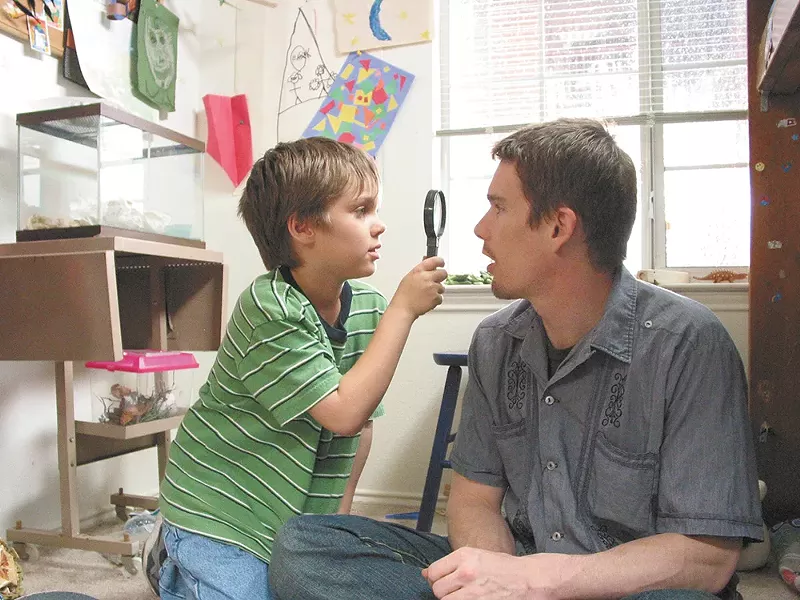 A young Ellar Coltrane with Ethan Hawke.