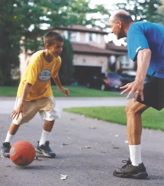 A young Kevin Pangos goes one-on-one with his dad, Bill Pangos.