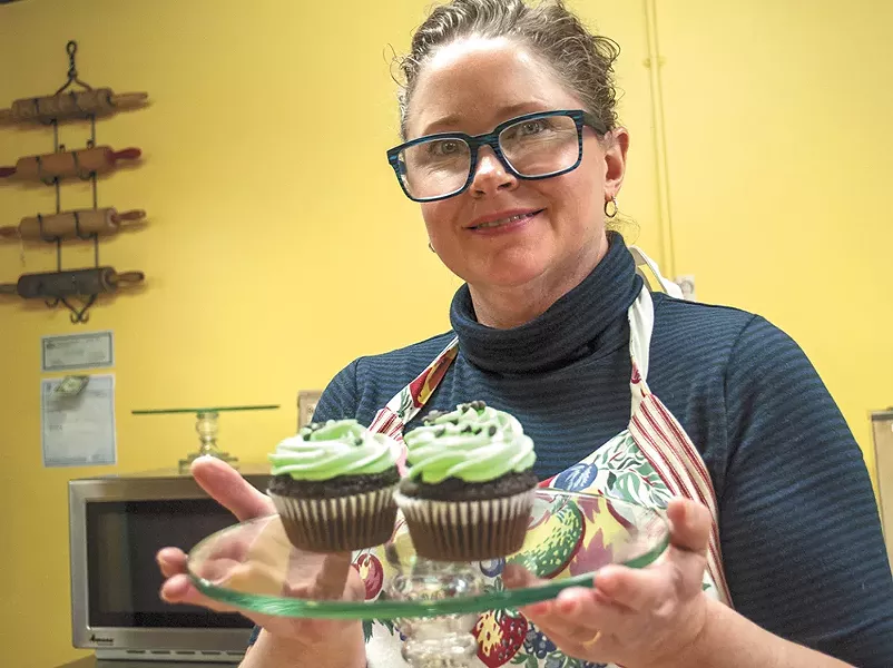 Alberta Bake Shop owner Robie Calcaterra shows off some mint chocolate chip cupcakes. - SARAH WURTZ
