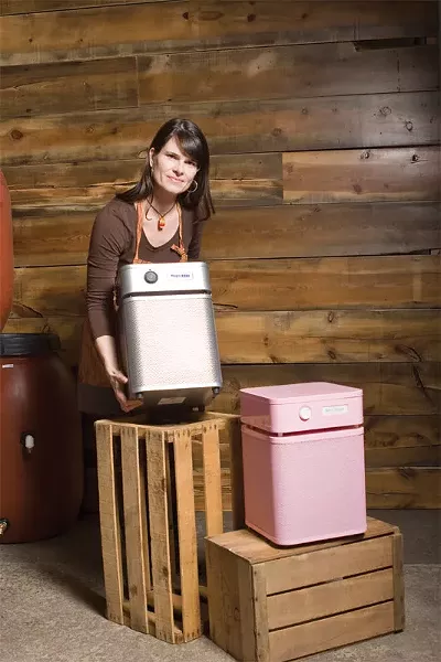 Angie Dierdorff of Sun People Dry Goods with Austin air filtration systems. - STEPHEN SCHLANGE