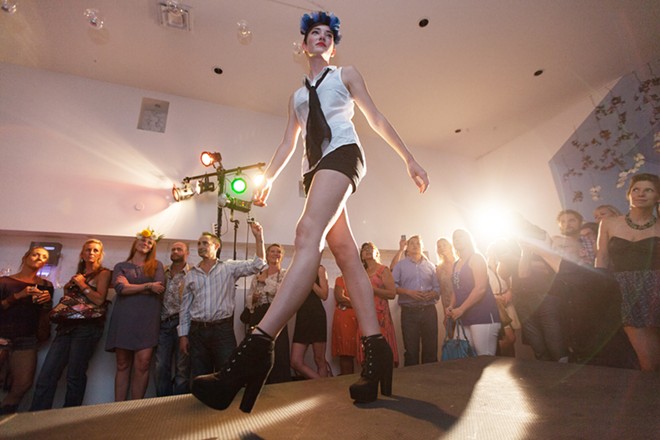 Ariel St. Clair walks the runway during "Mademoiselle," produced by Olive + Boone and held at The White Room on Aug. 22. - YOUNG KWAK