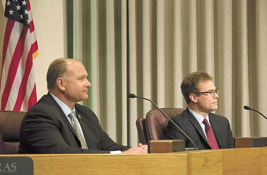 Both Sheriff Knezovich, left, and Doug Orr embrace Smart Justice ideas, but disagree on leadership styles. - JACOB JONES