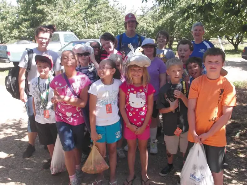 Boys and Girls Club out cherry picking.