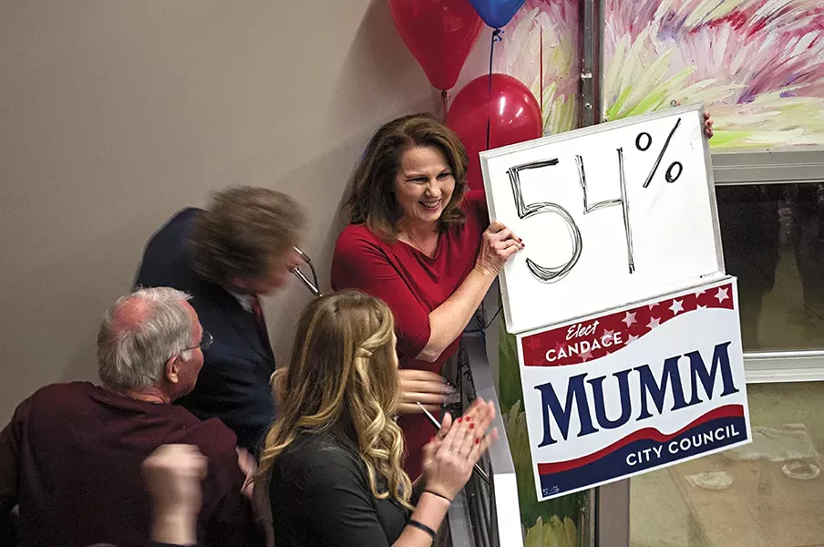 Candance Mumm, backed by Council President Ben Stuckart, celebrates Tuesday night. - SARAH WURTZ