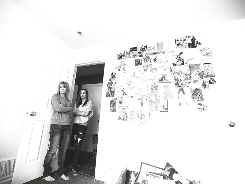 Carrie Holliday, left, and her 14-year-old daughter, Sydney, inside Casey's bedroom, which has been mostly untouched for two years. - YOUNG KWAK