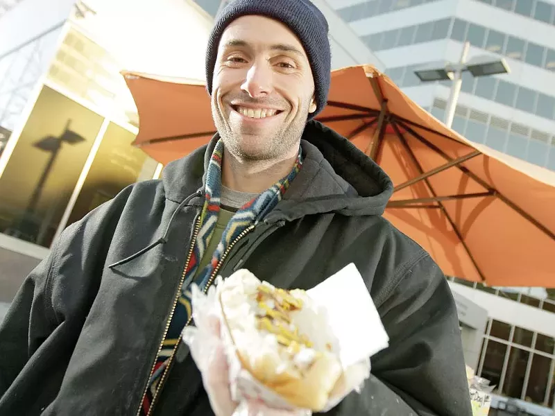 'Cheddar' Chad Rattray with his Polish hot dog - YOUNG KWAK