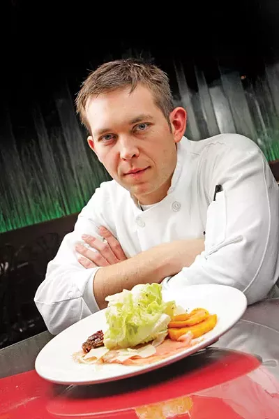 Chef Adam Hegsted (pictured with his Harvest Salad) has added heart-healthy options. - YOUNG KWAK