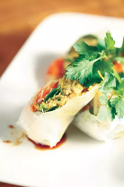 Chef Curtis Smith has embraced healthy cuisine to deal with his own diabetes; his spring rolls get fiber into the mix with celery, dates, carrots and apples. - YOUNG KWAK
