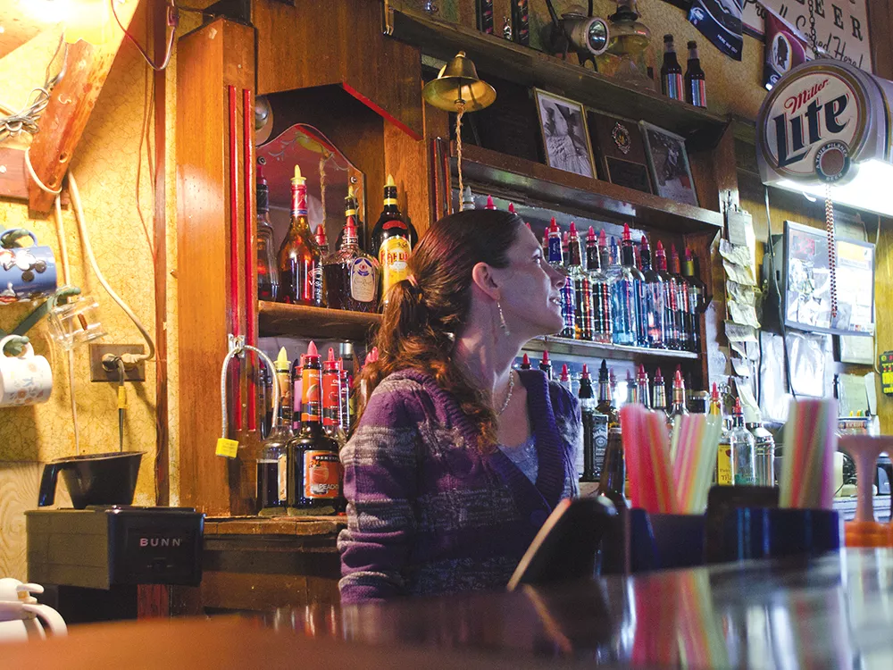Christina Axtman, a part-time bartender at the Outlaw Tavern: \"The mine keeps Mullan alive.\" - JACOB JONES