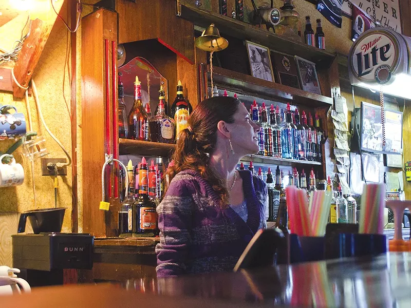 Christina Axtman, a part-time bartender at the Outlaw Tavern: \"The mine keeps Mullan alive.\" - JACOB JONES
