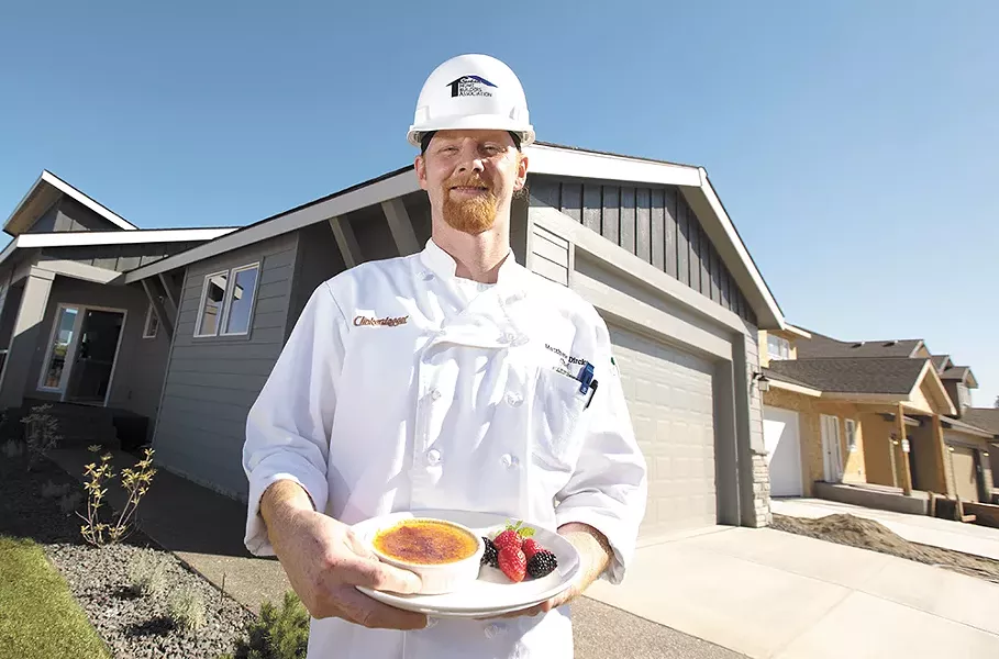 Clinkerdagger Executive Chef Matthew Dircks with a burnt cream dessert at a newly constructed home in the Eagle Ridge neighborhood. - YOUNG KWAK