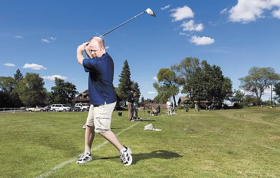 Clint Preston practicing on the driving range at Indian Canyon Golf Course, which is getting a facelift this spring. - STEVEN SCHLANGE