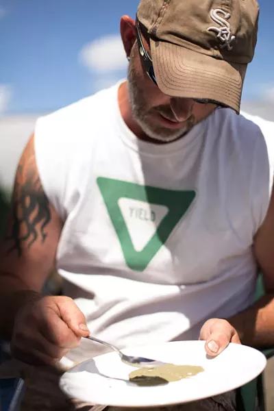 Co-Owner Wesley Tuttle spreads out hash on a plate. - YOUNG KWAK