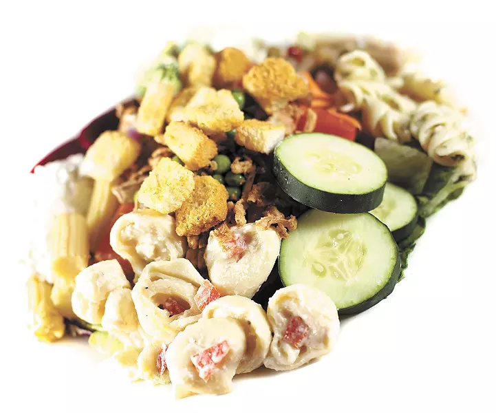 Create your own lunch at the Rocky Rococo salad bar. - YOUNG KWAK