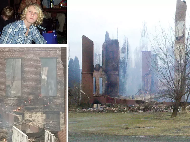 Daniel Uhnak and the remains of the Sisters' Building fire - COURTESY KXLY