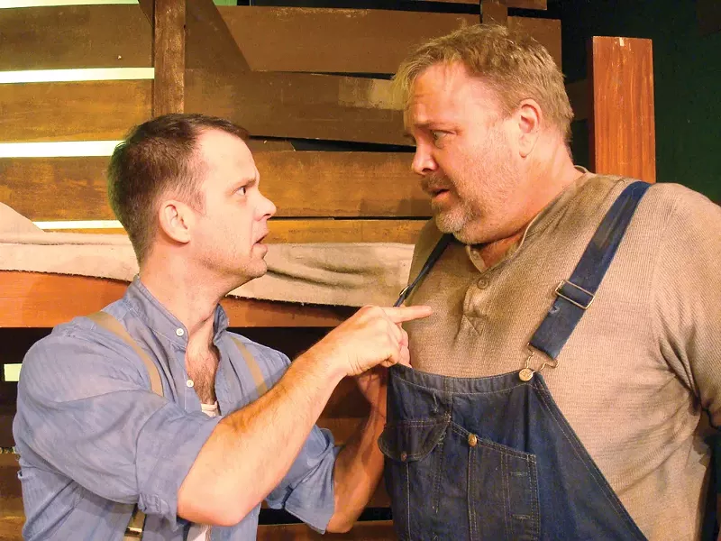 David Gigler (right) as Lennie in a 2011 performance of Of Mice and Men.
