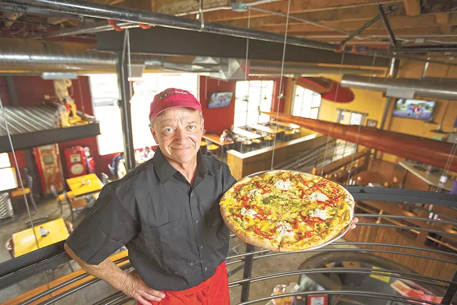 David's Pizza owner Mark Starr reopened the restaurant after four years serving his pizza at Famous Ed's. - YOUNG KWAK