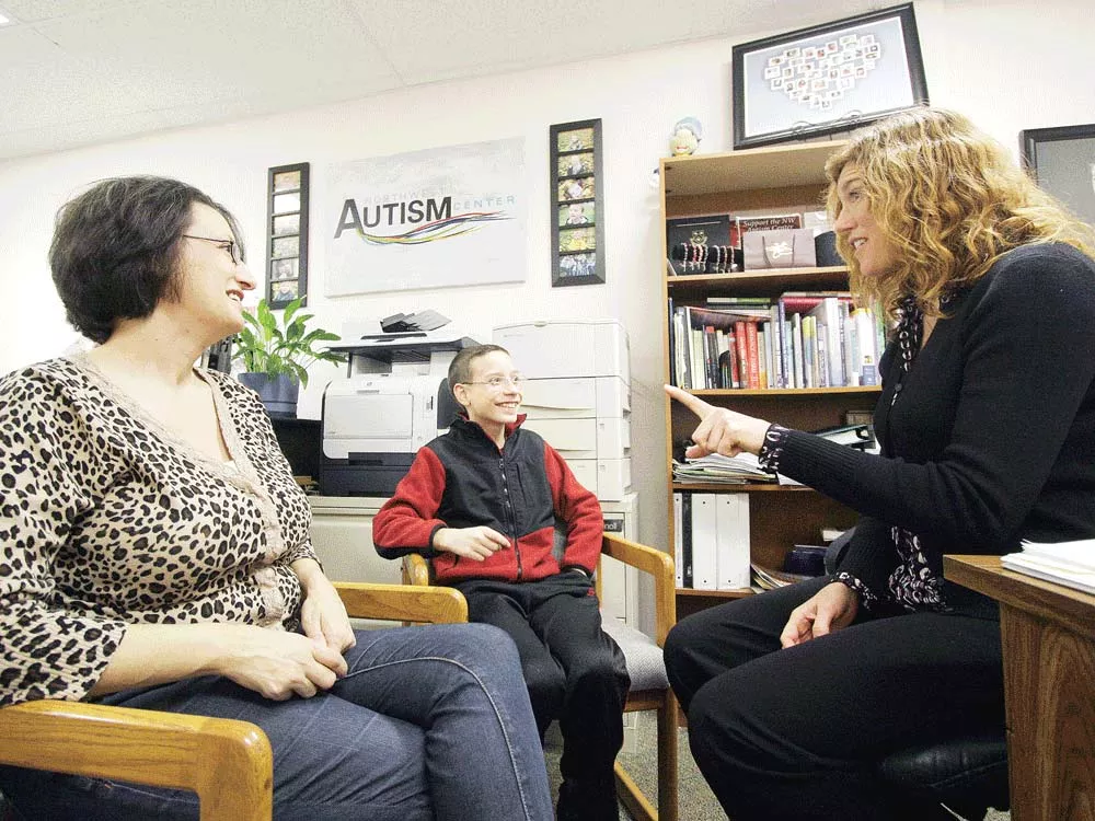 Dawn Sidell with 12-year-old J.J. Clardy, who was diagnosed with Aspergers - a form of autism - four years ago. - YOUNG KWAK