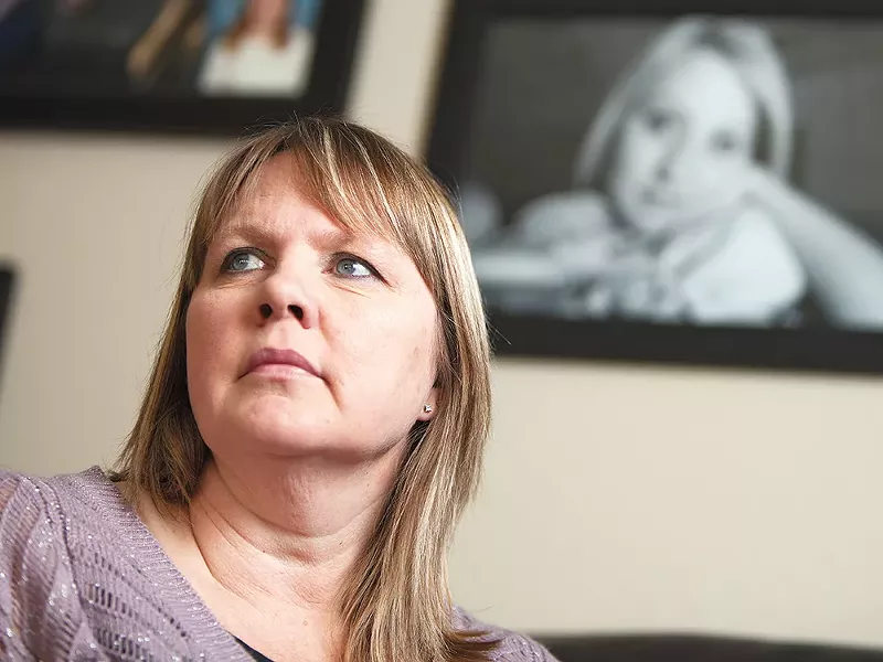 Debi Hammel, with her daughter's photo in the background, says: "It's crazy to think about the amount of lives she's touched." - YOUNG KWAK