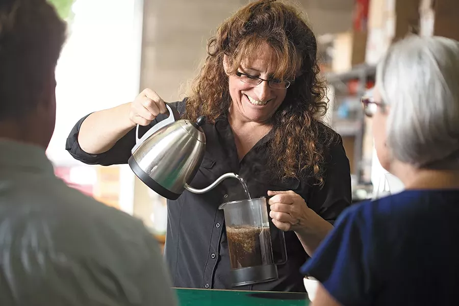 Deborah Di Bernardo prepares French press coffee at Roast House. - YOUNG KWAK