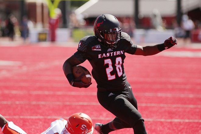 Eastern Washington running back Jalen Moore (28) runs in for a touchdown during the first half. - YOUNG KWAK
