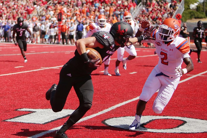 Eastern Washington wide receiver Cooper Kupp, left, is chased down by Sam Houston State safety Michael Wade (2) during the first half. - YOUNG KWAK