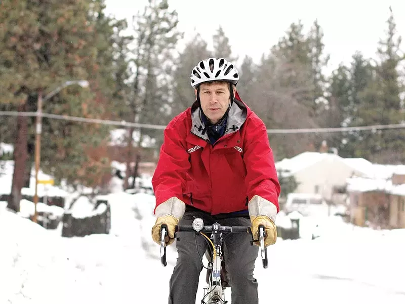 Eric Erickson rides his bike on the South Hill - YOUNG KWAK