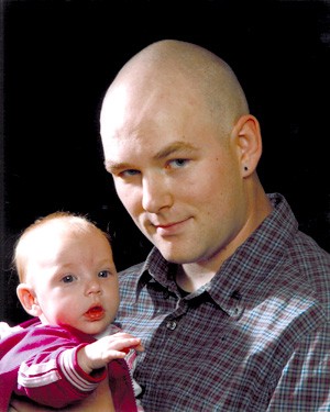 Ethan Corporon, 29, shot and killed by Spokane police on Nov. 12. Pictured with his daughter, Cheryl.