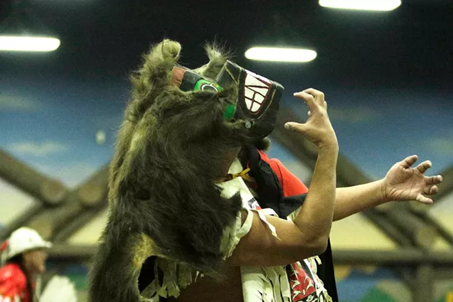 Frank Brown, of the Tlingit and Haida Indian Tribes of Alaska, dances in clothing honoring the Bear Clan. - YOUNG KWAK