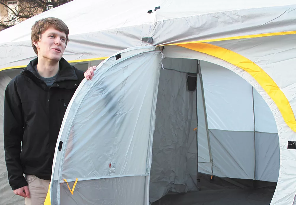 Gonzaga freshman Jake Sahli shows off the spacious tent he and friends spent a few cold nights in to get close to the action in the MacCarthey Athletic Center.