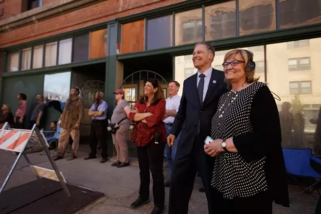 Governor Jay Inslee, second from the right, and his wife Trudi watch a scene being filmed. - YOUNG KWAK