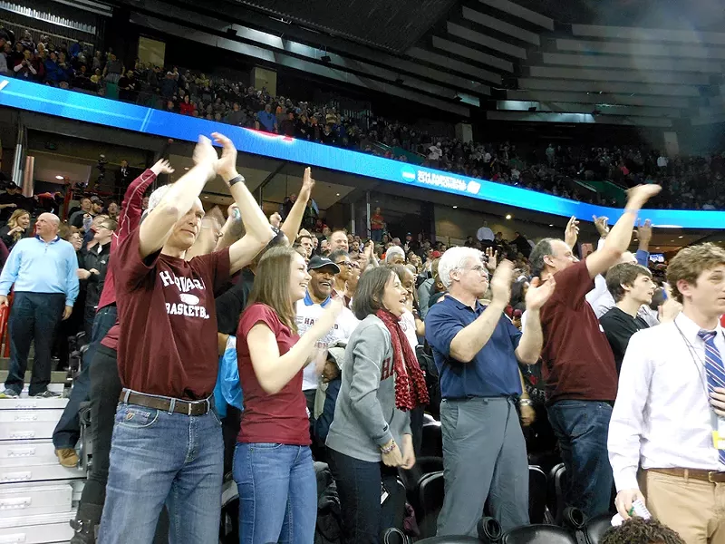 Harvard fans celebrate their upset win. - MIKE BOOKEY