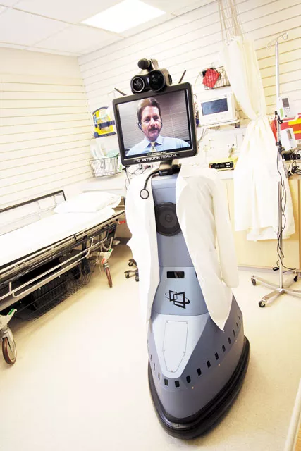 Hawkeye — the Intouch Health RP-7i — is operated here by Intouch Healths Denny Lordan. Lab coat optional. - YOUNG KWAK