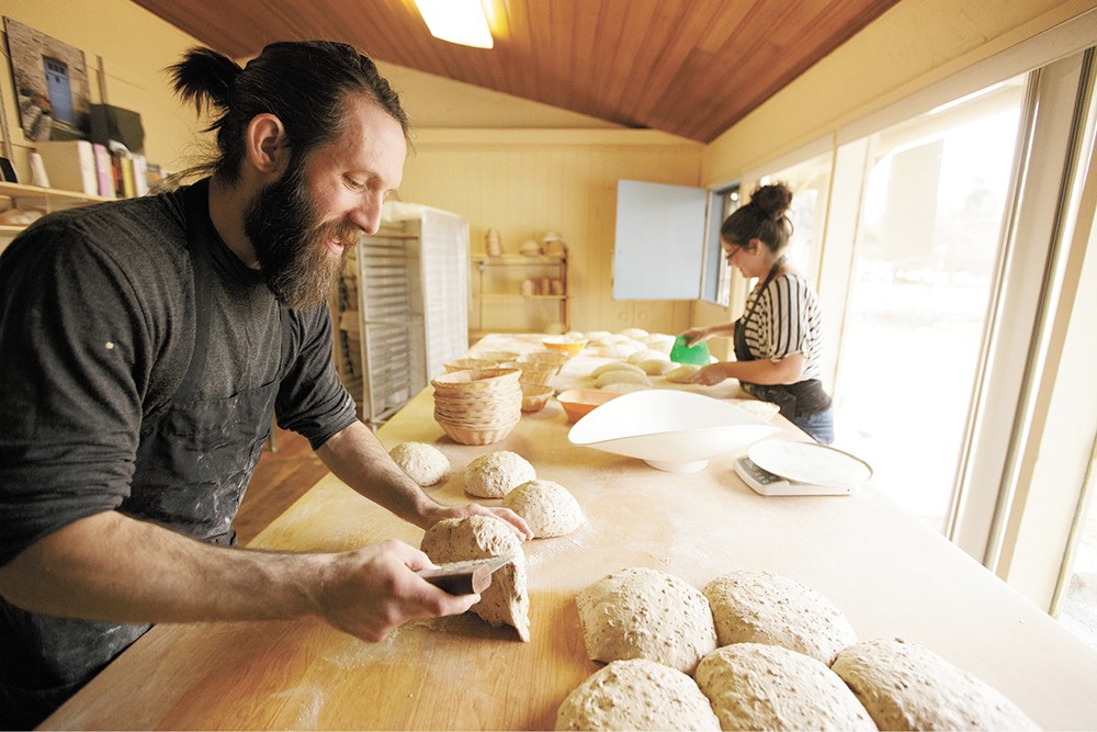 Head baker baker Shaun Thompson Duffy, left, works in the South Hill bakery alongside Alissa Wilde. - YOUNG KWAK