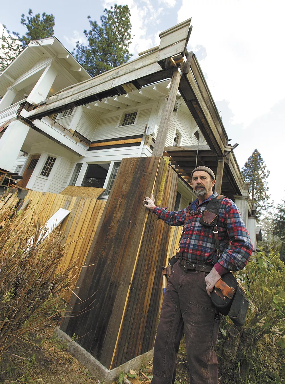 Henry Pierce III next to a Spokane house that's been in his family for three generations. - YOUNG KWAK
