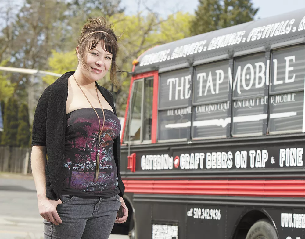 Hop Shop owner Mel Wood in front of the new Tap Mobile, which she lovingly calls "Black Betty." - YOUNG KWAK