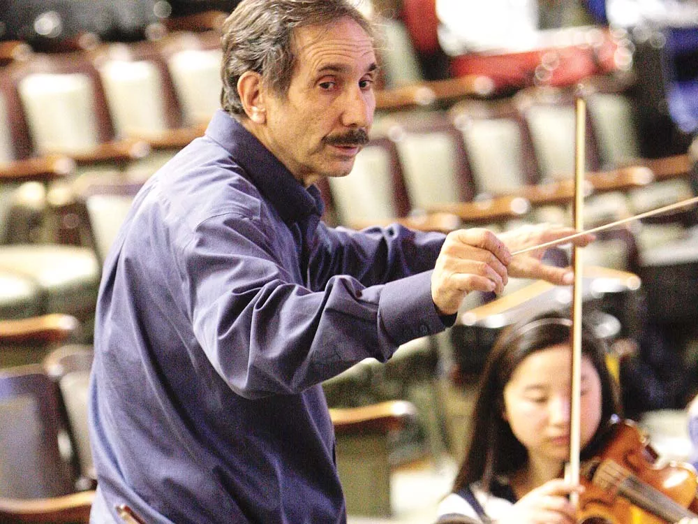 'I came for a night and stayed for 15 years.' Verne Windham at one of his final orchestra rehearsals. - YOUNG KWAK