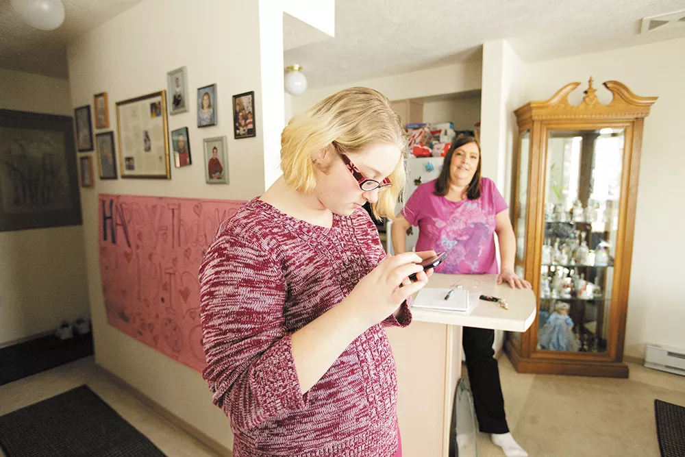 "I feel normal," says Alecia Crider, here visiting at her mom Tammy's apartment, "but not like real normal." - YOUNG KWAK