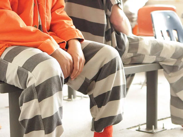 Inmates at Geiger, where nearly 50 percent of the staff has been laid off in the past two weeks. - YOUNG KWAK