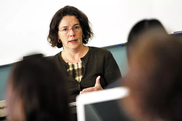 Jackie Banasik, ARNP/PhD, teaches a PhD-level course at the WSU Spokane College of Nursing at the Riverpoint Campus. The school aims to help meet the demand for more nurse practitioners. - YOUNG KWAK