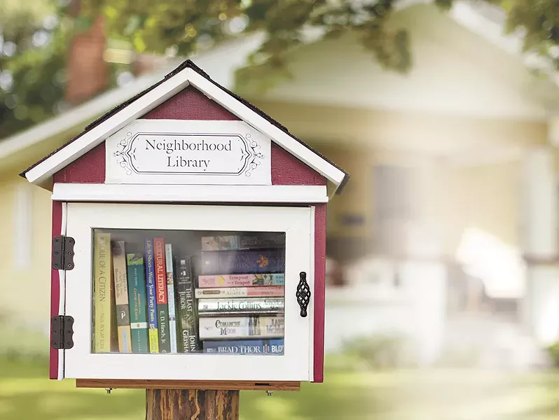 Jan Hansen's little library in northwest Spokane. - YOUNG KWAK