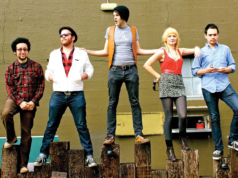 Jared Mees (center) and his band, the Grown Children